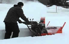 32 inch two-stage snow blower in action