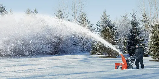 Ariens two-stage snow blower in action
