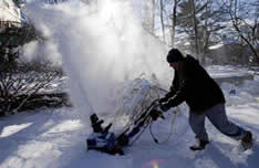 Snow Joe snow blower in action