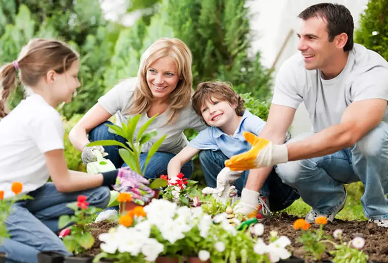 Kids gardening with parents